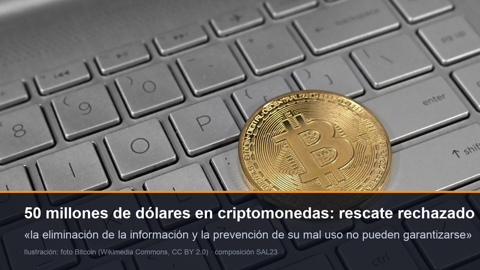 Moneda física de bitcoin sobre un teclado de portátil, con el rechazo de GMO al rescate de 50 millones de dólares en criptomonedas exigido por los atacantes